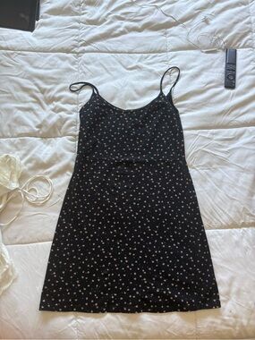 brandy melville black dress red stripe Black Brandy Melville side stripe mini dress. Really